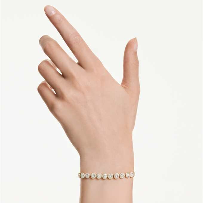 Brățară Una Angelic cu cristale tăiate rotund, albă, placată cu aur Brățară Una Angelic cu cristale tăiate rotund, albă, placată cu aur