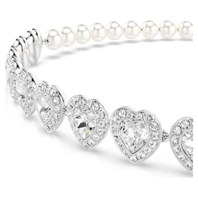 Colier strâns pe gât Ariana Grande X Swarovski cu tăieturi mixte, perle de cristal, inimă, alb, placat cu rodiu Colier strâns pe gât Ariana Grande X Swarovski cu tăieturi mixte, perle de cristal, inimă, alb, placat cu rodiu